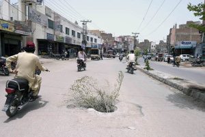 An open manhole in the middle of Risala Road poses a safety hazard and requires immediate attention from the concerned authorities