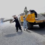 Labourers are busy construction work of head Muhammad wala road