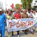 Pakistan Mazdoor Mahaz Punjab President Doctor Ali Amin and Labour Wing President M. M. Atif Advocate leading a Labour Day Rally from TMA Chowk to District Press Club