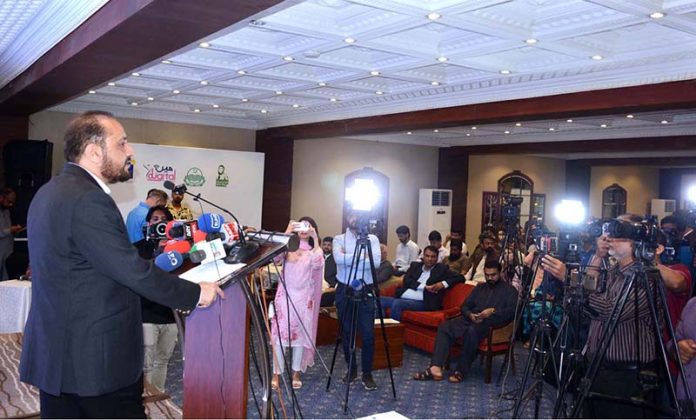 Provincial Minister for Health and Population Khawaja Imran Nazeer is addressing the participants during Desktop Distribution Ceremony at local Hotel