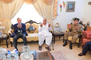 Prime Minister Muhammad Shehbaz Sharif along with Defence Minister Khawaja Muhammad Asif, Chief of the Army Staff General Syed Asim Munir and Minister for Information and Broadcasting Attaullah Tarar offering condolences to the family of Shaheed Squadron Leader Usman Yousaf at his residence