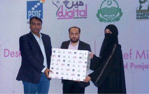 Provincial Minister for Health and Population Khawaja Imran Nazeer is distributing desktop computers during a ceremony at local Hotel