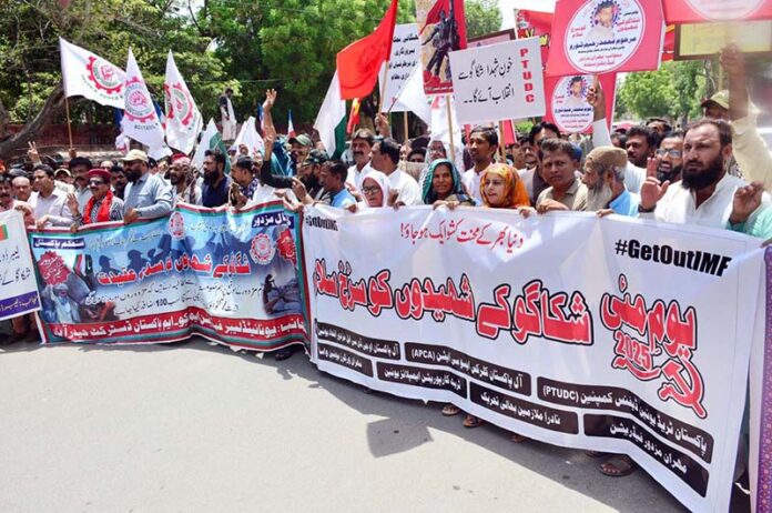 Workers of different organizations are participating in a rally on the eve of World Labour Day. May 1st, International Workers' Day, commemorates the historic struggles of working people worldwide. In 1884, the Federation of Organized Trades and Labour Unions passed a resolution declaring that eight hours would constitute a legal day's work, effective from May 1, 1886