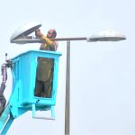 Municipal corporation staffers busy repairing work of street light at Kalma Chowk