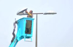 Municipal corporation staffers busy repairing work of street light at Kalma Chowk