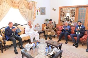 Prime Minister Muhammad Shehbaz Sharif along with Defence Minister Khawaja Muhammad Asif, Chief of the Army Staff General Syed Asim Munir and Minister for Information and Broadcasting Attaullah Tarar offering condolences to the family of Shaheed Squadron Leader Usman Yousaf at his residence
