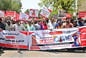 Workers of different organizations are participating in a rally on the eve of World Labour Day. May 1st, International Workers' Day, commemorates the historic struggles of working people worldwide. In 1884, the Federation of Organized Trades and Labour Unions passed a resolution declaring that eight hours would constitute a legal day's work, effective from May 1, 1886