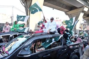 Federal Minister for Railways Hanif Abbasi talking to media persons during 'Pakistan Zindabad Rally' on Murree Road to celebrate Thanksgiving Day, expressing solidarity with the Pakistan Armed Forces following the successful military operation 'Bunyan Marsous' against India.