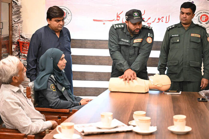 Rescue 1122 staffers providing training on first aid to save human lives during a workshop at the Press Club
