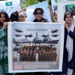 Students of Government College Women University Faisalabad (GCWUF) hold placards and banners to express gratitude to the Pakistan Army for its successful response against Indian aggression