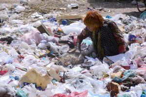 In the heart of Korangi, a woman sifts through garbage — not for scraps, but for survival.