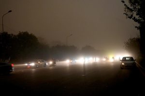 A view of dense dust storm before rain that hit the city.