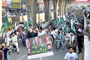 A large number of people participate in the 'Pakistan Zindabad Rally' on Murree Road to celebrate Thanksgiving Day, expressing solidarity with the Pakistan Armed Forces following the successful military operation 'Bunyan Marsous' against India.