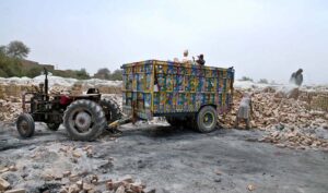 A youngster labourer on the way along with donkeys near a local bricks kiln as the world celebrates International Labour Day. May 1st, International Workers' Day, commemorates the historic struggles of working people worldwide. In 1884, the Federation of Organized Trades and Labour Unions passed a resolution declaring that eight hours would constitute a legal day's work, effective from May 1, 1886