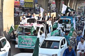 A large number of people participate in the 'Pakistan Zindabad Rally' on Murree Road to celebrate Thanksgiving Day, expressing solidarity with the Pakistan Armed Forces following the successful military operation 'Bunyan Marsous' against India.