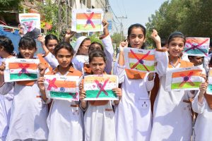 Students of Royal Public School System hold a protest against Indian airstrikes at Latifabad