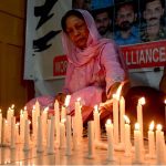 Convener of the World Minorities Alliance, J. Salik, along with his wife, lighting candles to show solidarity as the nation observed Youm-i-Tashakur on Friday across the country to honour the armed forces and the people for their victory in Operation Bunyan-um-Marsoos against India