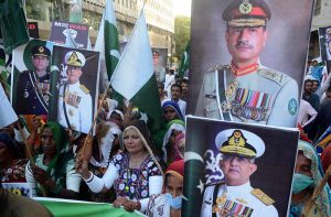 Participants of the Pakistan People’s Party Minority Wing Karachi Division in rally celebrate the success of Operation Bunyan al Marsoos against Indian aggression outside the Karachi Press Club.