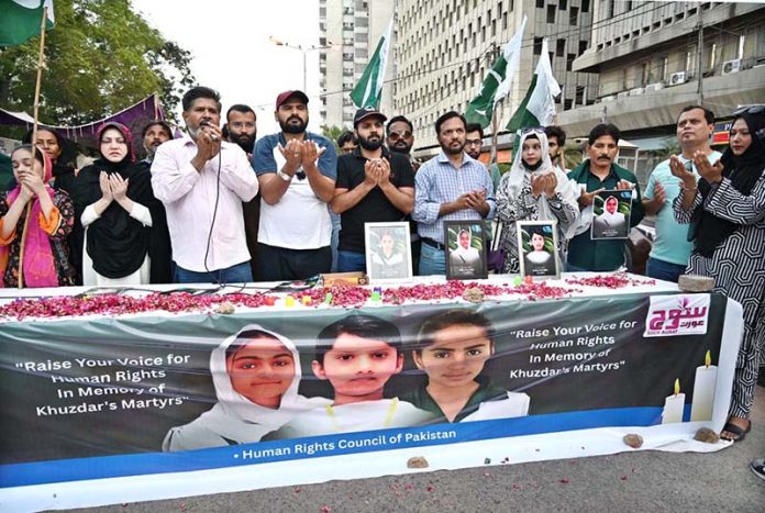 Human Rights Council of Pakistan offering Dua for the soul of the martyred children during protest against the terrorist attack in Khuzdar at Karachi Press Club