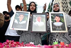 Human Rights Council of Pakistan offering Dua for the soul of the martyred children during protest against the terrorist attack in Khuzdar at Karachi Press Club