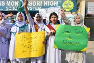 Students of Royal Public School System hold a protest against Indian airstrikes at Latifabad