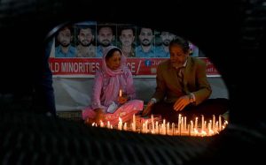 Convener of the World Minorities Alliance, J. Salik, along with his wife, lighting candles to show solidarity as the nation observed Youm-i-Tashakur on Friday across the country to honour the armed forces and the people for their victory in Operation Bunyan-um-Marsoos against India