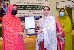 Member Balochistan Assembly, Kalsoom Niaz giving a shield to participants at the launch of a Modern TVET Center and renovation of the Public Library in Jafferabad, at NUST Balochistan Campus