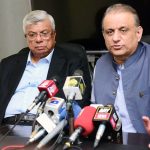Federal Minister for Communications Aleem Khan speaks to media after a meeting with the business community at Arif Habib Centre
