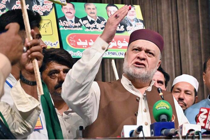Federal Minister for Poverty Alleviation and Social Safety Syed Imran Ahmad Shah addressing the Labour Convention organized by the PML-N Labour Wing on the occasion of International Labour Day at Al-Hamra