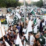 Members of the Karachi Electronics Dealers Association hold a rally in support of the Armed Forces at the Karachi Press Club