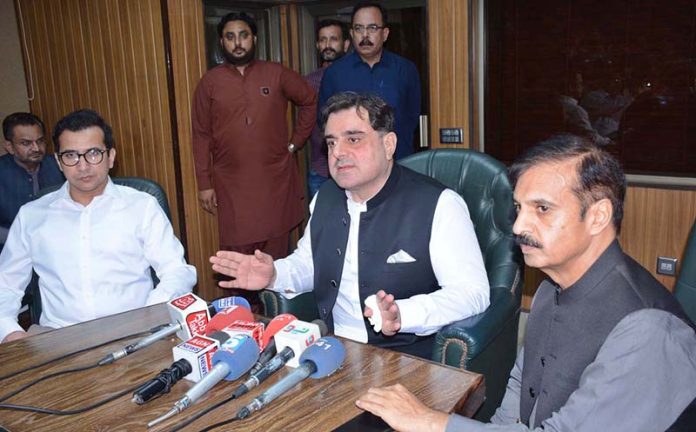 Minister for Housing, Urban Development and Public Health Engineering, Mr. Bilal Yasin is talking to media personnel after inaugurate the system for issuing on-spot ownership clearance certificates at the FDA Complex