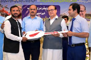Minister of State for Planning and Development, Chaudhry Armaghan Subhani, distributes motorcycles to veterinary staff of the Livestock Department, enhancing their mobility and service capabilities