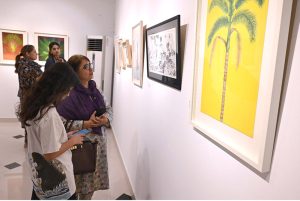 An art lover observing a creation during the preview of "The Next Wave" featuring 14 promising NCA graduates of 2025 on display at Gallery 6.