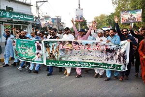 A large number of people participate in a rally organized to celebrate Thanksgiving Day, expressing solidarity with the Pakistan Armed Forces following the successful military operation 'Bunyan Marsous' against India.