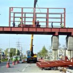 Labourers are busy installing overhead bridge as the world celebrates International Labour Day. May 1st, International Workers' Day, commemorates the historic struggles of working people worldwide. In 1884, the Federation of Organized Trades and Labour Unions passed a resolution declaring that eight hours would constitute a legal day's work, effective from May 1, 1886