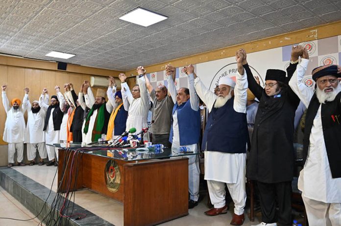 Members of interfaith harmony making hand chain to express solidarity with the Pakistan Army after Indian airstrikes