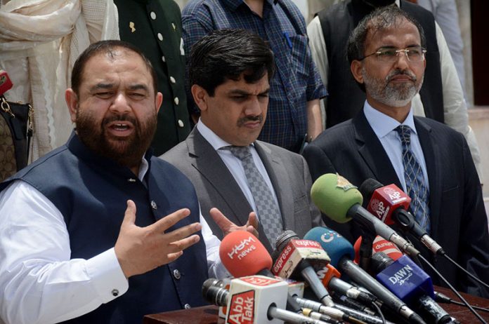Federal Minister for National Heritage and Culture Division Aurangzeb Khan Khichi addresses media at the mausoleum of Quaid-e-Azam Muhammad Ali Jinnah. Minister of State Huzaifa Rehman is also present