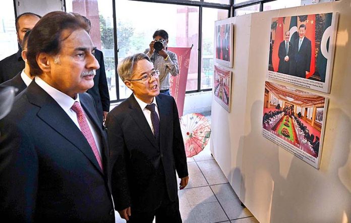 Speaker of the National Assembly of Pakistan Sardar Ayaz Sadiq and Chinese Ambassador to Pakistan, Jiang Zaidong visiting the Photo Exhibition and Hanfu try-on tea break during the event ‘Celebrating the 74th Anniversary of the Establishment of Diplomatic Relations between China and Islamic Republic of Pakistan 1951-2025 at Silk Road Culture Center Sir Syed Memorial Building