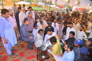 Milk is being weighed after getting it from Kamoki-based goat “Mastani” that won first prize worth Rs.200,000/- during a competition of the 27th International Goat, Bull and Camel festival on late Tuesday night at University of Agriculture Faisalabad (UAF)