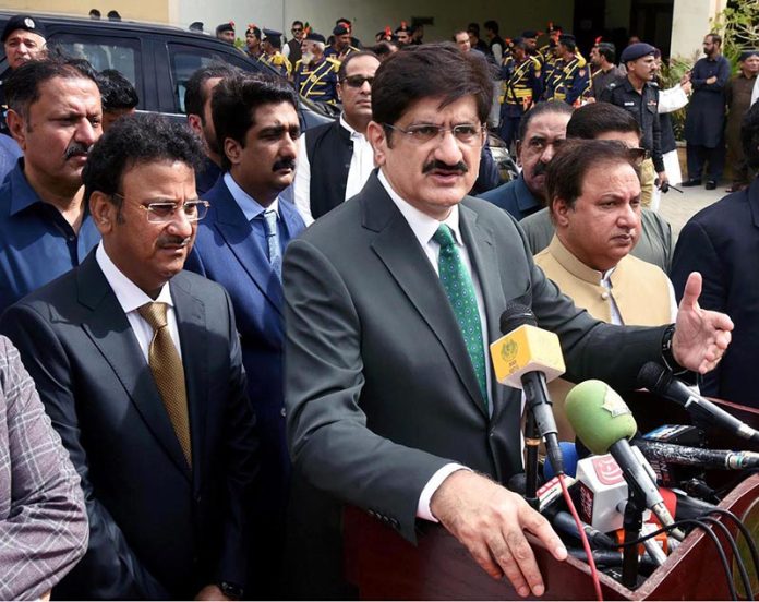 Sindh Chief Minister Syed Murad Ali Shah speaks to the media after performing a flag-hoisting ceremony at the Sindh Secretariat