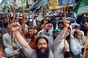 Activist of Pakistan Muslim League Q holding a protest rally against Indian attacks on Pakistani cities outside Karachi Press Club