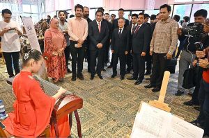 Speaker of the National Assembly of Pakistan Sardar Ayaz Sadiq and Chinese Ambassador to Pakistan, Jiang Zaidong experiencing Hanfu try-on tea ceremony during the event ‘Celebrating the 74th Anniversary of the Establishment of Diplomatic Relations between China and Islamic Republic of Pakistan 1951-2025 at Silk Road Culture Center Sir Syed Memorial Building