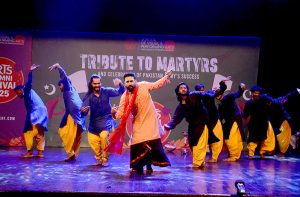 Young artists performing in a stage play to pay tributes to Martyrs and celebration of Pakistan Armed Forces success against Indian aggression during three days Arts Alumni Festival 2025 at Arts Council of Pakistan