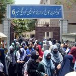 Students coming out of Women Girls College Korangi after appearing in their Intermediate examinations