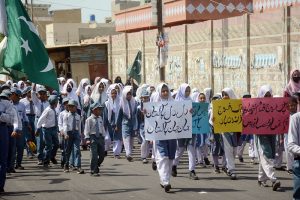 Students coming out of Women Girls College Korangi after appearing in their Intermediate examinations