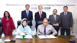 Secretary CCP, Ms.Marryum Pervaiz and NAB Director General Operations, Mr. Muhammad Tahir, signing MOU to enhance cooperation between CCP and NAB. Chairman CCP, Dr. Kabir Ahmed Sidhu and Chairman NAB Lieutenant General (Retd) Nazir Ahmed Butt, senior officials also present