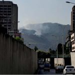 A view of smoke emitting after fire erupts at Margalla Hills in the Federal Capital