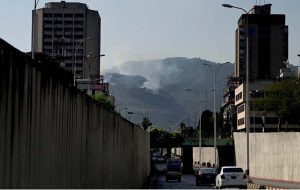 A view of smoke emitting after fire erupts at Margalla Hills in the Federal Capital