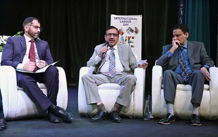 Managing Director Associated Press of Pakistan (APP) Muhammad Asim Khichi speaks in panel discussion during International Labour Day Conference on Workers and Employers: Navigating Change Through Social Dialogue organized by National Industrial Relations Commission (NIRC) and International Labour Organization (ILO) at PNCA