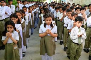 Teachers and Students of Government Girls High School Little Folks offering Dua during a ceremony to mark Youm-e-Tashakur (Thanksgiving Day) to expressing solidarity with the Pakistan Armed Forces following the successful military operation ‘Bunyan-um- Marsous’ against Indian aggressions